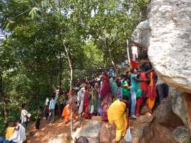 Devotees waiting for their turn to see the holy forest goddess 